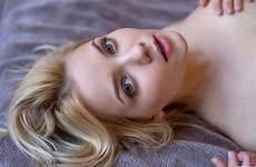 mpl studios cali blonde model bed face lying lips eyes women green pink back lipstick viewer looking juicy bokeh wallpaper