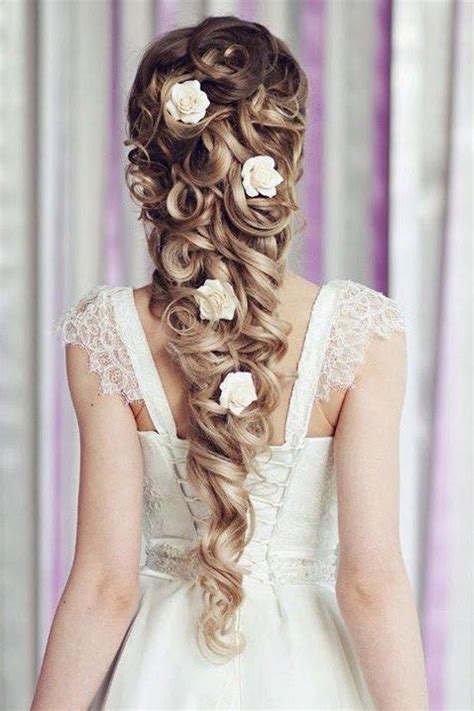 Pull back your natural curls into a bun and use a headpiece with large jewels. Fairytale wedding hairstyle | Disney princess hairstyles ...