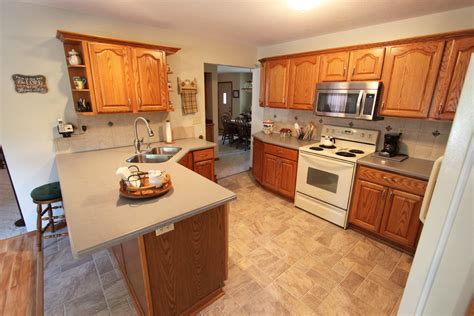 Welcome to corian ® design: Gray Corian Countertop and Gray Tile Backsplash ...