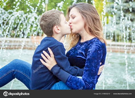 Then pop a seat and enjoy the ride. Young Beautiful Mother Her Son Enjoying Together Happy ...