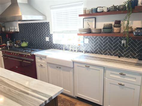 You'll get the personal attention you need to make your dream kitchen a reality. Black tile back splash, farmhouse sink, marble countertops, floating shelves, and a Lacanche ...