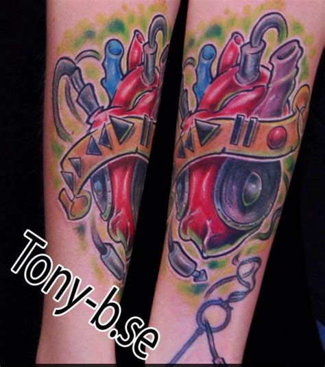 The tattoo designs in the slideshow below are meant to give you an idea of what's out there. Heart Speaker Tattoo by Tony Boufandene: TattooNOW