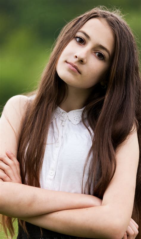 This website requires you to be 21 years of age or older. Photo of a 13-year-old brunette girl photographed in May 2015, picture 23