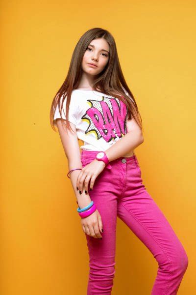 Luckily, it is not hard to do, although it does take some time and effort. A beautiful 13-years old girl dressed in jeans and T-shirt in studio on black background — Stock ...