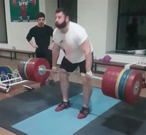 The jerk begins from the front rack position, which is the finishing position of the clean.the lifter dips a few inches by bending the knees, keeping the back vertical, and then explosively extends the knees, propelling the barbell upward off the shoulders, and then quickly dropping underneath the bar by pushing upward with the arms and splitting the legs into a lunge position, one forward. Lasha Talakhadze Shows Off Insane Raw Strength with 310kg ...