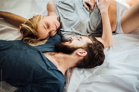 Beautiful Couple Laying In Bed In The Morning by Nemanja Glumac - Couple, Bed