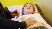 CU Shot of young girl getting physical exam at doctor's office /...