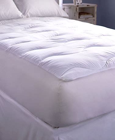 Enter electric heated mattress pads. The Lakeside Collection Extra-Thick Wave-Quilted Mattress ...