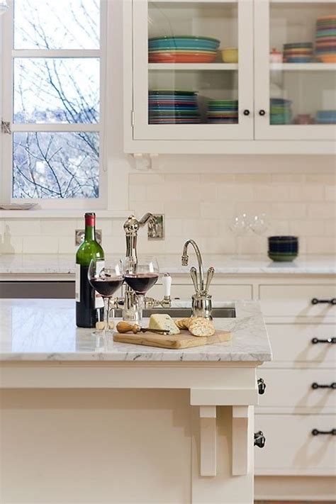 The different tile sizes provide some interesting flow and movement to the space, and the gray paint around the alcove shower (note the marble hex tile at the bottom there) highlights the veining really well. Traditional Kitchen Design Ideas, Pictures, Remodel and ...