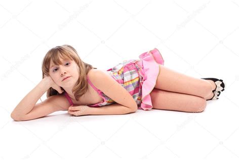 4 teen girls lying down, arm in arm, holding hands, chatting. Little girl lying down, isolated on white — Stock Photo ...