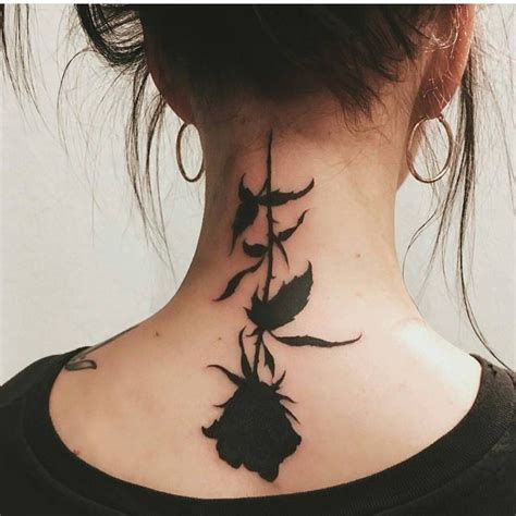 When choosing colors, while the red rose is most common for love and lust, white roses mean purity and innocence, as well as new beginnings. She Is Violet in 2020 | Neck tattoo, Neck tattoos women ...