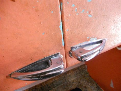 Remove nails, staples or screws from the loose joint and scrape away old glue with a utility knife. This is a close up of the cabinet hardware. They look ...