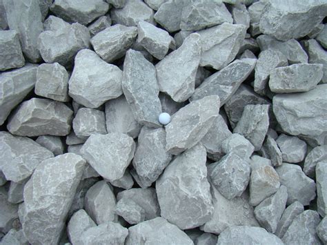 Gravel sizes range from around 0.12 inches (0.32 cm) to about 4 inches (10.16 cm). Rip Rap | Indianapolis Decorative Rock | McCarty Mulch