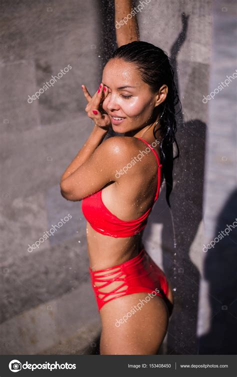 Вспышка07 (freak in the morning freak in the evening !!) Sporty young beautiful sexy woman in a red swimsuit taking ...