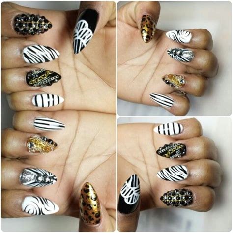 Stiletto nails with design.. find me at Vanity Beauty ...