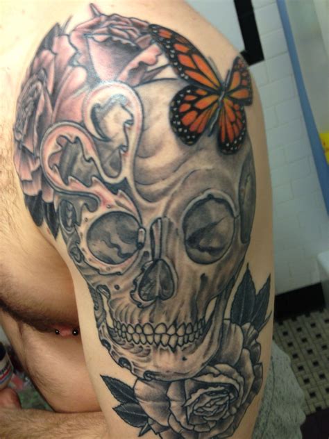 'butterfly' tattoo on her left armpits. Bio mechanical skull rose butterfly tattoo sprocket heart ...
