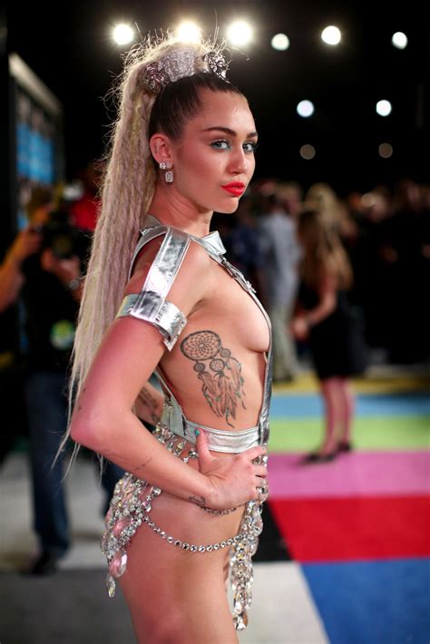 The disney darling turned pop star, miley cyrus has already got an impressive collection of tattoos and there is no sign of her stopping anytime. Miley Cyrus Maybe Didn't Realize She Got a Tattoo of ...