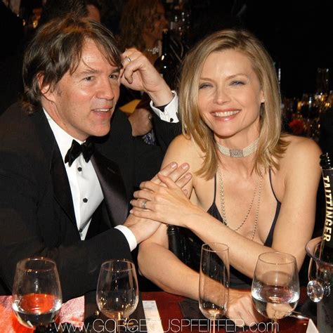 Law but left in 1992 to start his own series, picket fences. Michelle Pfeiffer and husband David E.Kelley at the 9th ...