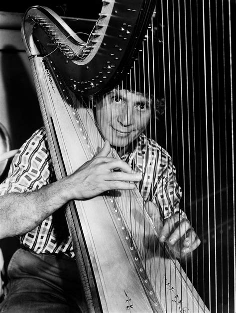 One of four brothers who made motion pictures together arthur. Harpo Marx, 1935 Photograph by Granger