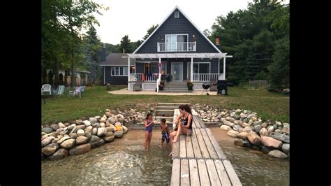 Indoor vaulted ceilings with large picturesque windows. Torch Lake, Elk Rapids, MI | Michigan cottage, Lake cabins ...