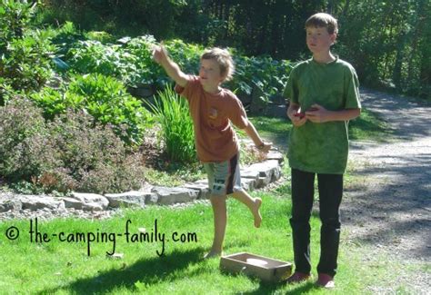 By tossing a washer into the same hole that your opponent has hit, you will cancel out his score. Washer Toss Game: Rules For A Fun Game To Play While Camping