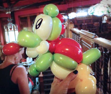 A character is a fictional person. Balloon Yoshi Photo by pacalin | Balloon animals, Balloons ...