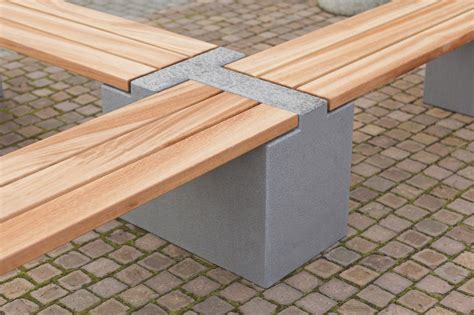 Werden sitzflächen aus holz gestaltet, wirkt die bank viel freundlicher und einladender. Garden bench / contemporary / stone / wooden TRIC Rinn ...