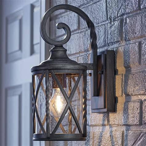 With a flushmount design, you're able to maximize the floor to ceiling height, making it perfect for outdoor areas, such as covered porches, garages or car. Home Decorators Collection 1-Light Antique Pewter 14.5 in. Outdoor Wall Lantern Sconce with ...