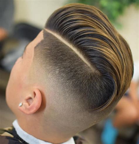 The fade haircut is a popular, flattering style where the hair is cut short near the temples and neck and gradually gets longer near the top of the head. 50 Cool Trending High Fade Haircut For Men (2021 Guide)