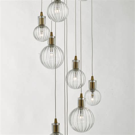 The rim of the glass is a bit rough but i still found them a good value. Dito - Brass & Glass 10 Light Cluster Pendant - Lightbox