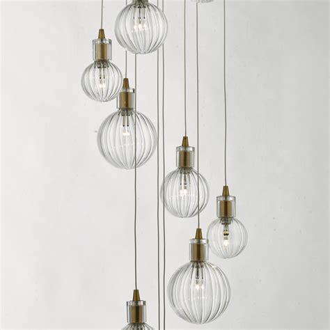 Our vera glass pendant light is made of translucent glass, so you get plenty of light and a peek at the our stella faceted pendant features octagonal facets handmade of antique brass and glass that allow. Dito - Brass & Glass 10 Light Cluster Pendant - Lightbox