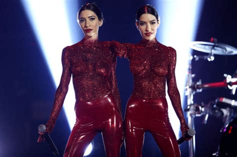 Hailing from brisbane, australia, identical twins jess and lisa origliasso formed the veronicas in 2005. Veronicas go topless for Aria Music Awards in body paint ...