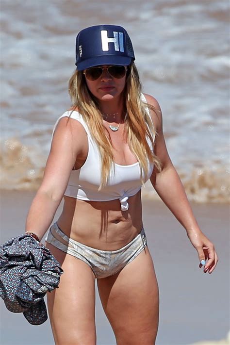 Sometimes when women wear a lower rise or smaller fit they try to compensate by pulling them further up on their hips, causing the fabric to wedge in the wrong places. HILARY DUFF in Bikini at a Beach in Maui 08/04/2017 ...