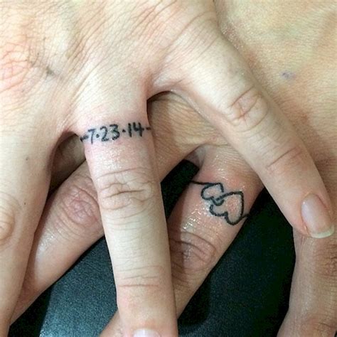 Couple tattoos love love tattoos white tattoos tatoos cross tattoos heart tattoos disney infinity browning deer tattoo dog tags tattoo. 15 Couples Who Exchanged Their Wedding Rings For Tattoos