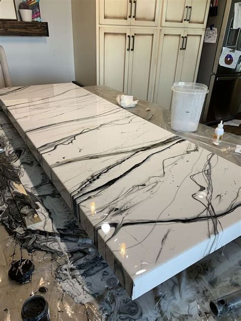For that reason, we opted we had to make a faucet change at the last minute, so we were out a few more dollars. How to Make a Simple Epoxy Countertop DIY | Epoxy countertop, Diy countertops, Resin countertops