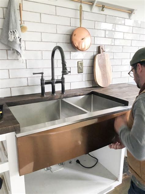 If you have a dishwasher with a flexible hose. DIY Install an Apron Front Sink with a Butcher Block ...