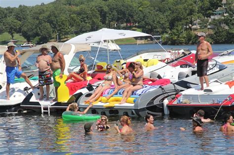 Girls getting beads and having fun in the water at the labor day weekend boat party. Party Cove at the Lake of the Ozarks, MO | It's Great to ...