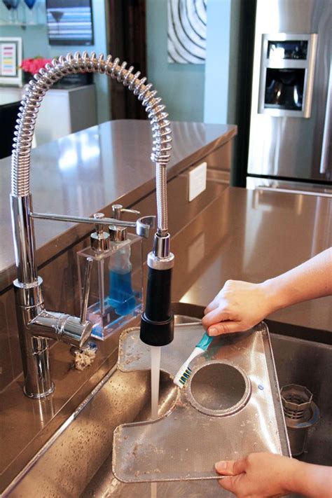 Inspect the spinning arms of the dishwasher; How to Clean a Dishwasher | Dishwasher cleaning tips ...