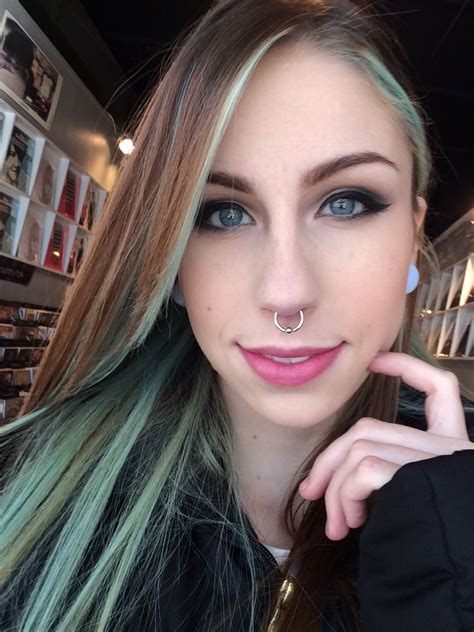 A vertical tip or rhino piercing goes vertically through the tip of your nose, from the top of your nose to just underneath near the septum. How does my septum look? Ring too big? (The piercing ...