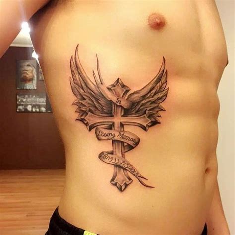 Here is one cool christian tattoo idea where the portrait of jesus is inked between the cross tattoo. 75+ Best Rib Tattoos Designs & Meanings - All Types (2019)