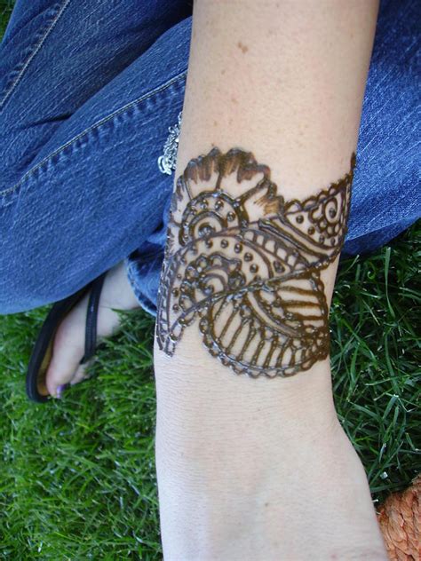 A mud paste is applied, which, when removed, leaves a temporary henna stain, and this is where the name henna tattoo comes from. Skin Art Painting by Henna Tattoos Ogden Utah