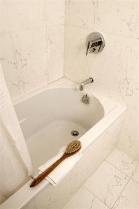 Knowing how to clean a bathtub properly makes the difference between having a soothing bathing experience, or enduring a grimy disaster with a very unsightly view. How to Clean a Yellowing Fiberglass Tub | Plastic bathtub ...