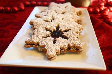 Christmas pudding cookies are chocolate sugar cookies decorated to look like a traditional christmas pudding which is a date pudding popular in the uk and the sweet raspberries accentuate the toasted almonds and subtle brown sugar flavor of these traditional austrian christmas cookies. Linzer sables, a Christmas jewel of a cookie | Christmas ...