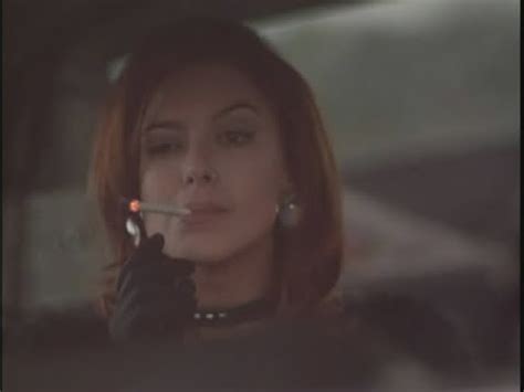 And if you keep your finger near the `fast forward' button you can. Kari Wuhrer Smoking in RED BLOODED AMERICAN GIRL II - YouTube