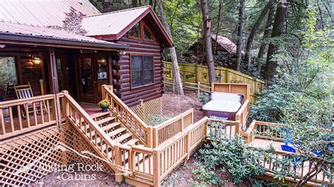 Access the falls via a short boardwalk trail. River Rock | Sliding Rock Cabins®
