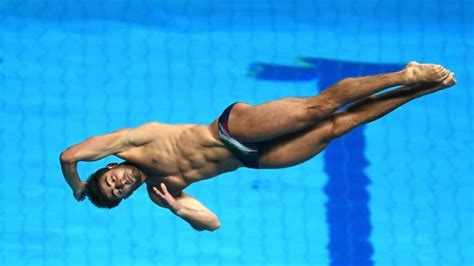 Springboards are commonly fixed by a hinge at one end (so they can be flipped up when not in use), and the other end usually hangs over a swimming pool, with a point midway between the hinge and the end resting on an adjustable fulcrum SF: 3m Men Springboard Diving