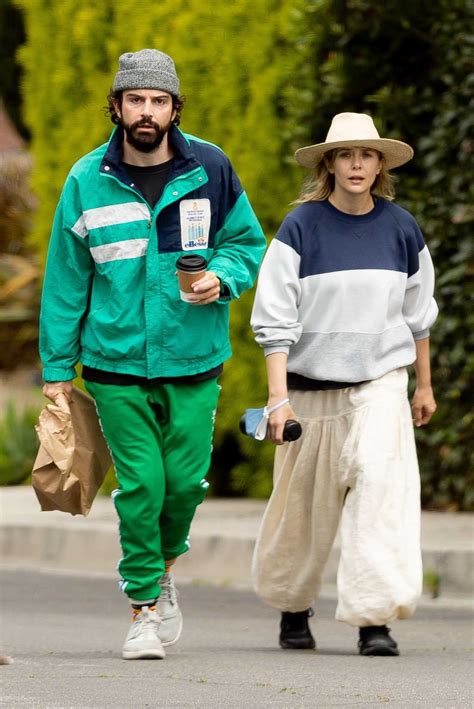 Elizabeth olsen is possibly dating a musician robbie arnett from the year 2017. Elizabeth Olsen in a Beige Straw Hat Was Seen Out with Her ...