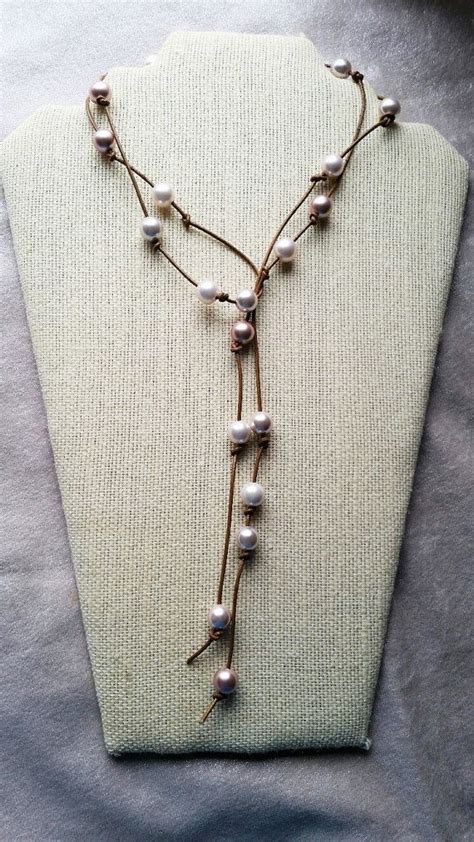 Choker necklace lengths are typically 14 inches long, but we'll finish the necklace with an extension chain so you can adjust it to up to 17 inches. Image result for how to make a pearl and leather lariat ...