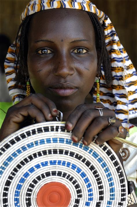 161 likes · 1 talking about this. A young Peul #refugee selling yoghurt and milk on a market ...