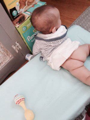 Instead of my pretty girl's clothes, mummy decided that i should be back in nappies for the day. Diaper change struggle - June 2015 - BabyCenter Canada